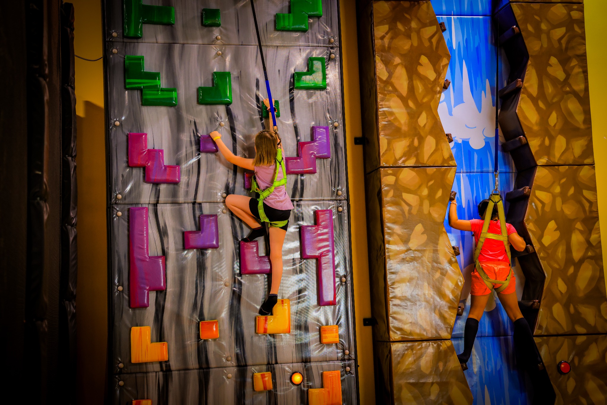 Children climbing in the Adventure Zone